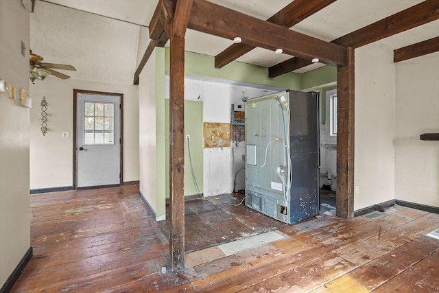 entryway featuring beam ceiling, ceiling fan, and dark hardwood / wood-style flooring