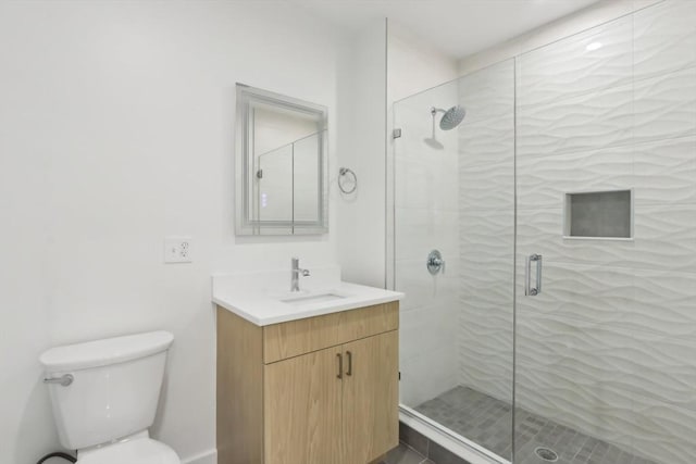256 Dorchester St Unit 408, Boston, MA 02127 - full bathroom with a stall shower, toilet, and vanity