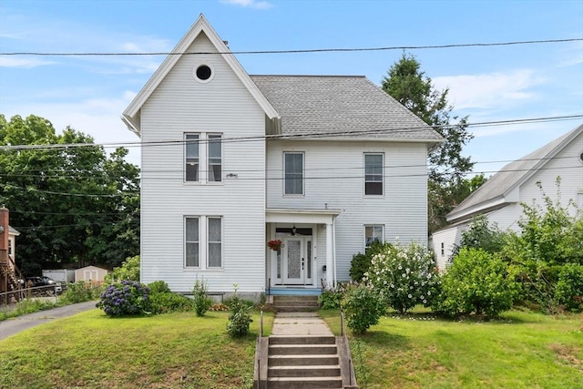 41 Edwards St, Southbridge, MA 01550 - view of front of property featuring a front lawn and roof with shingles