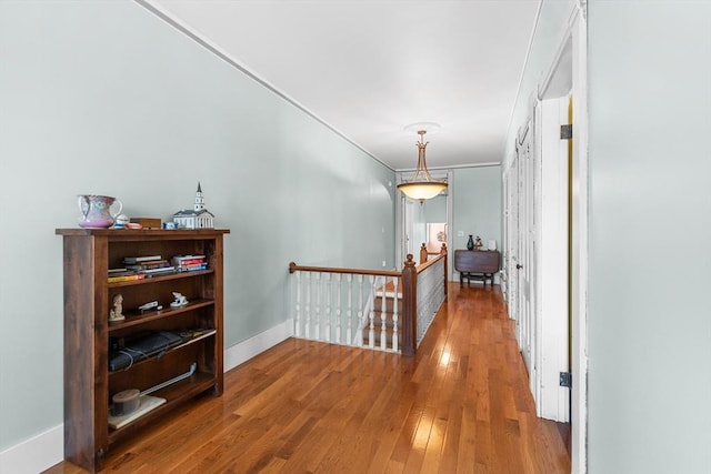 41 Edwards St, Southbridge, MA 01550 - corridor featuring an upstairs landing, hardwood / wood-style floors, and crown molding