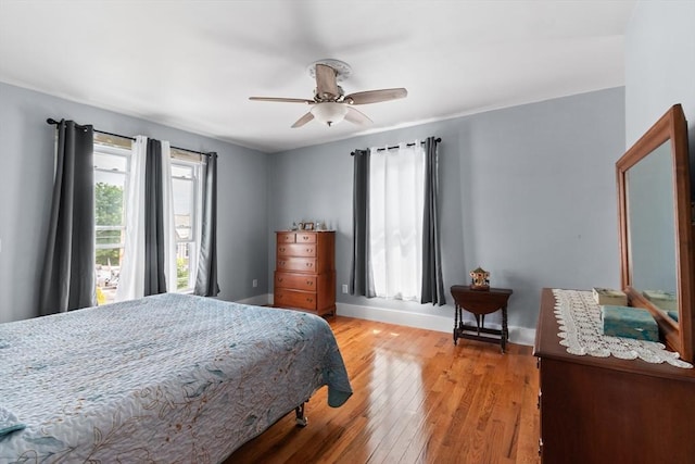 41 Edwards St, Southbridge, MA 01550 - bedroom with multiple windows, light wood-type flooring, and ceiling fan