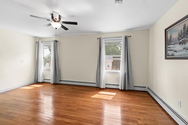 41 Edwards St, Southbridge, MA 01550 - empty room with a baseboard heating unit, light wood-style floors, ceiling fan, and a smoke detector