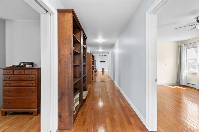 41 Edwards St, Southbridge, MA 01550 - hall with light wood-style floors and baseboards