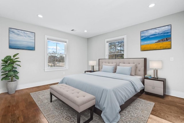 bedroom featuring dark wood-type flooring