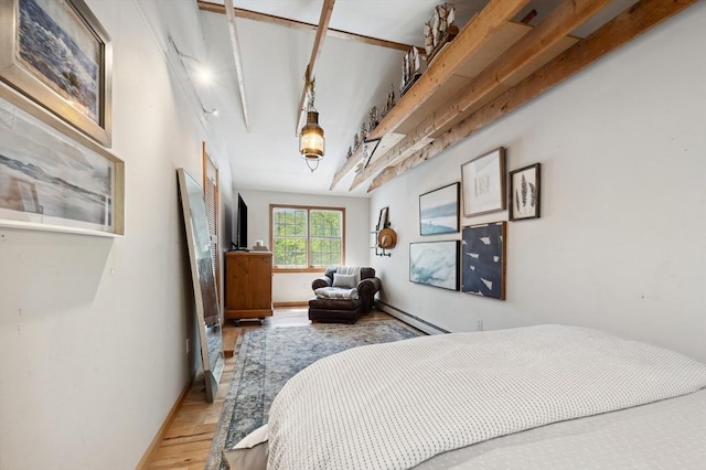 15 Youngs Rd, Gloucester, MA 01930 - bedroom featuring wood finished floors, baseboard heating, and baseboards