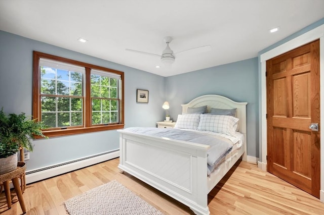 15 Youngs Rd, Gloucester, MA 01930 - bedroom featuring baseboard heating, light wood-style floors, a ceiling fan, and recessed lighting