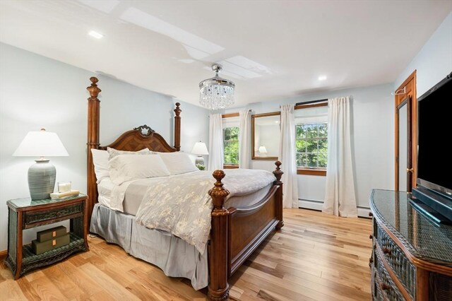 15 Youngs Rd, Gloucester, MA 01930 - bedroom with a chandelier, light wood-style flooring, recessed lighting, and baseboard heating