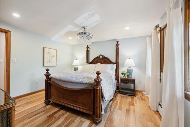 15 Youngs Rd, Gloucester, MA 01930 - bedroom with light wood-style floors, baseboards, a baseboard heating unit, and recessed lighting