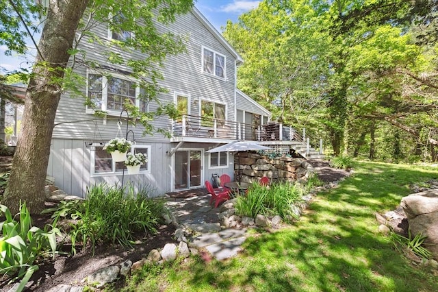 15 Youngs Rd, Gloucester, MA 01930 - rear view of property with a patio area