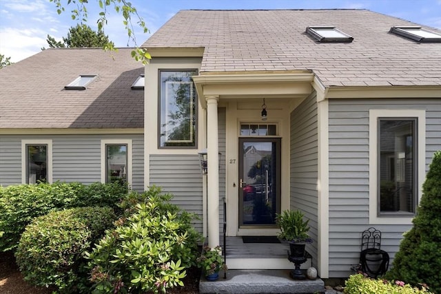 27 Quarryridge Ln Unit 27, Rockport, MA 01966 - view of exterior entry featuring a shingled roof