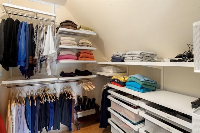 27 Quarryridge Ln Unit 27, Rockport, MA 01966 - spacious closet featuring wood finished floors and vaulted ceiling