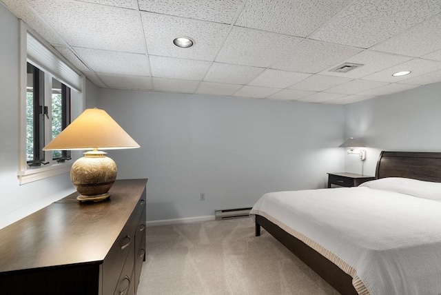 27 Quarryridge Ln Unit 27, Rockport, MA 01966 - bedroom with a baseboard heating unit, light carpet, a drop ceiling, and recessed lighting
