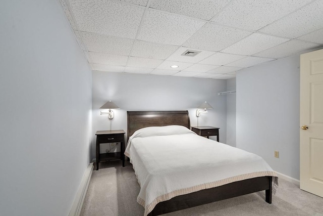 27 Quarryridge Ln Unit 27, Rockport, MA 01966 - bedroom featuring light carpet, a drop ceiling, and a baseboard radiator