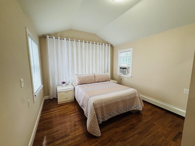 16 3rd St, Framingham, MA 01702 - bedroom featuring a baseboard heating unit, vaulted ceiling, wood finished floors, and cooling unit