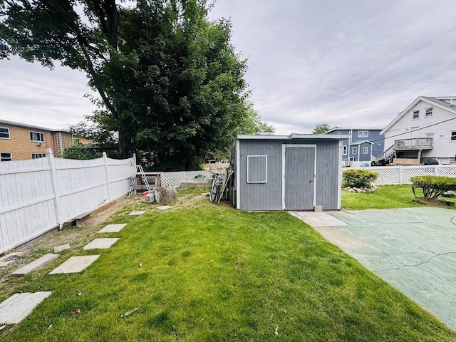 16 3rd St, Framingham, MA 01702 - fenced backyard featuring a storage shed