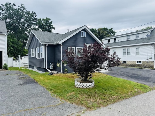 16 3rd St, Framingham, MA 01702 - view of front of house featuring roof with shingles