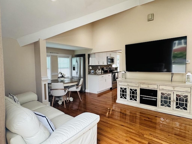 16 3rd St, Framingham, MA 01702 - living room featuring wood finished floors and lofted ceiling