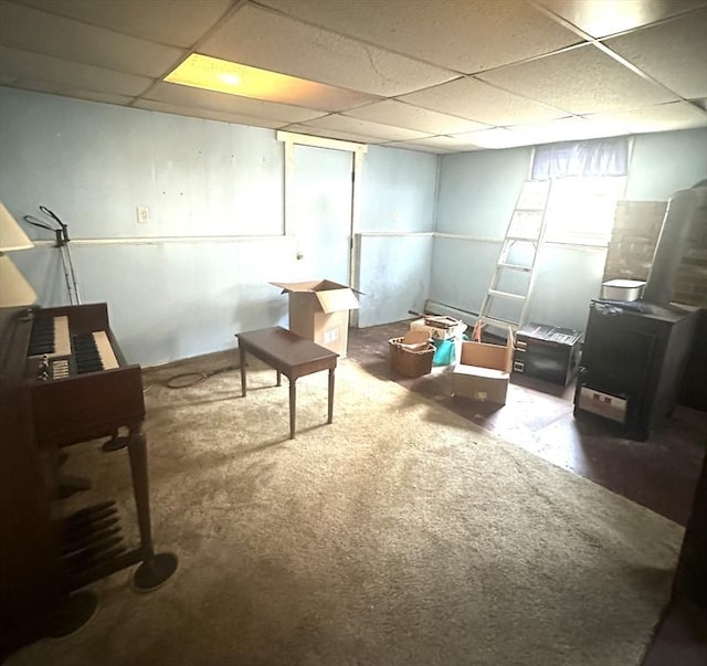 finished below grade area with a paneled ceiling