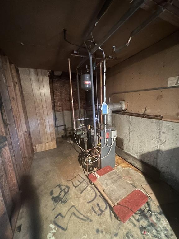utility room with a heating unit
