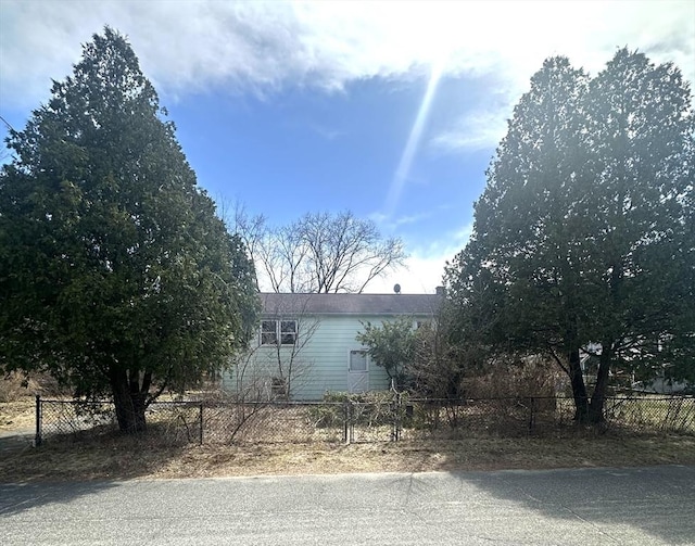 view of property exterior featuring fence private yard