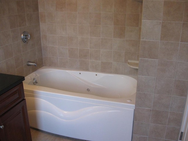 full bathroom with a shower, a bathing tub, and vanity