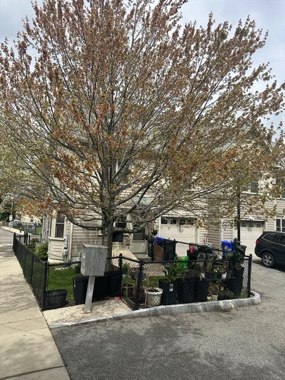 view of home's exterior featuring fence