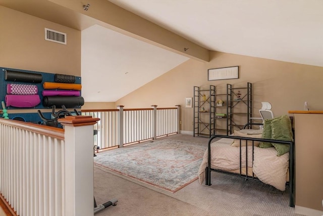 office space with vaulted ceiling with beams, carpet flooring, and visible vents