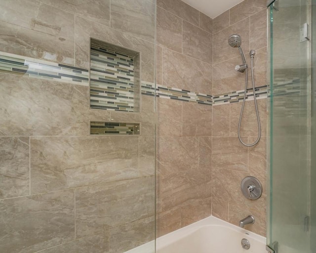 bathroom with shower / bath combination