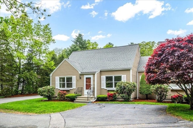 88 Cocasset St Unit 1, Foxboro, MA 02035 - new england style home with roof with shingles, a front yard, and driveway
