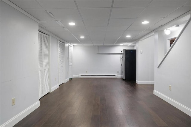 88 Cocasset St Unit 1, Foxboro, MA 02035 - finished basement featuring a baseboard heating unit, freestanding refrigerator, baseboards, dark wood-type flooring, and recessed lighting