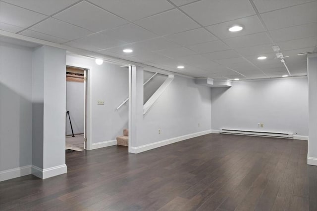 88 Cocasset St Unit 1, Foxboro, MA 02035 - finished basement with baseboard heating, baseboards, stairs, wood finished floors, and recessed lighting