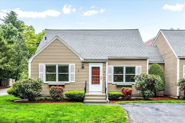 88 Cocasset St Unit 1, Foxboro, MA 02035 - view of front of house with a front lawn and roof with shingles