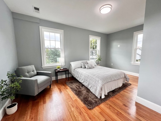 bedroom featuring wood-type flooring