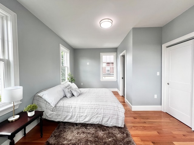 bedroom with light wood-type flooring