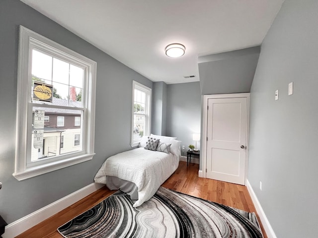 bedroom featuring hardwood / wood-style flooring