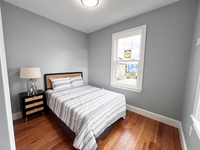 bedroom featuring hardwood / wood-style flooring