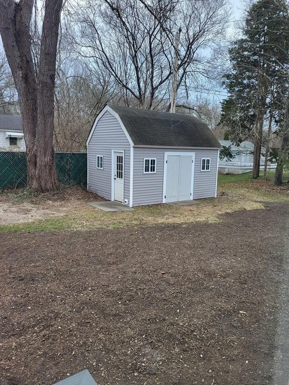 14 Rose Ave, Westport, MA 02790 - garage with fence