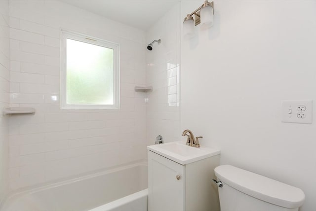 full bath featuring toilet, shower / bathtub combination, and vanity