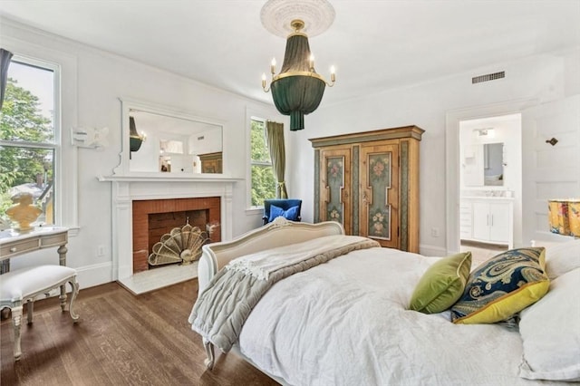929 Beacon St, Newton, MA 02459 - bedroom featuring wood finished floors, a fireplace, and ensuite bath
