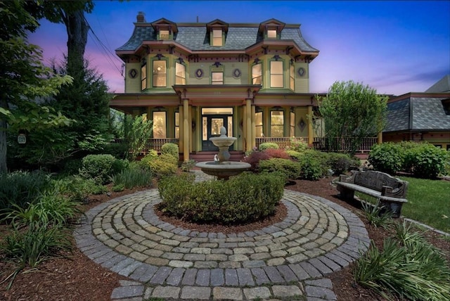 929 Beacon St, Newton, MA 02459 - back of house with mansard roof and covered porch