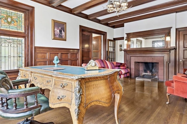 929 Beacon St, Newton, MA 02459 - dining space featuring a chandelier, a wainscoted wall, wood finished floors, beamed ceiling, and a brick fireplace