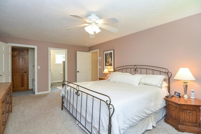 26 Kittredge St, Walpole, MA 02081 - bedroom with light carpet, baseboards, ceiling fan, and ensuite bath