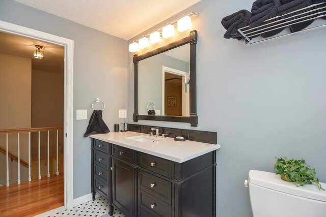 26 Kittredge St, Walpole, MA 02081 - bathroom with vanity, toilet, tile patterned floors, and baseboards