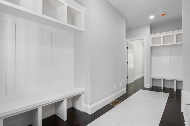 mudroom featuring dark hardwood / wood-style floors