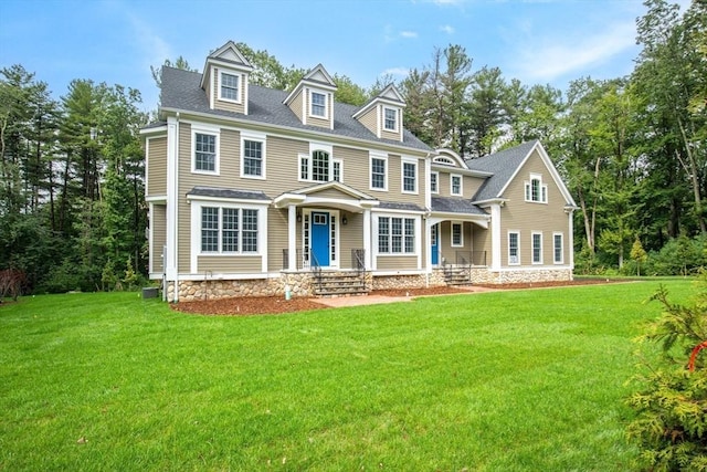 view of front of home with a front yard