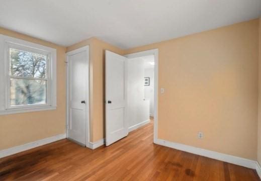 unfurnished bedroom featuring light hardwood / wood-style flooring