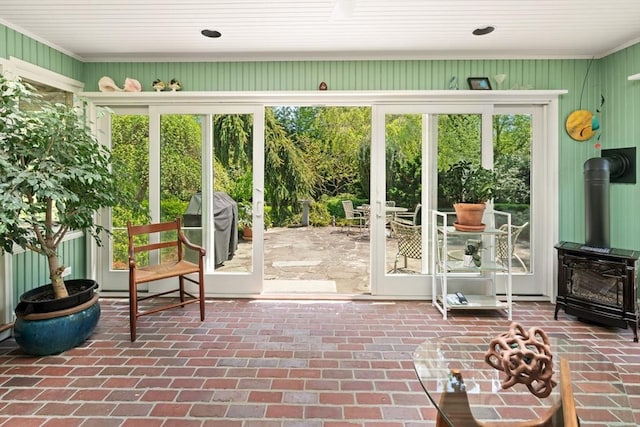 21 Fremont St, Dartmouth, MA 02748 - entryway with a wood stove, french doors, and brick flooring