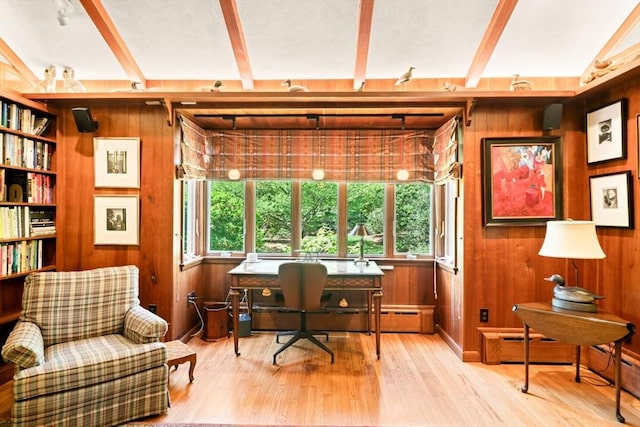 21 Fremont St, Dartmouth, MA 02748 - home office with beam ceiling, wood walls, and light wood-style floors