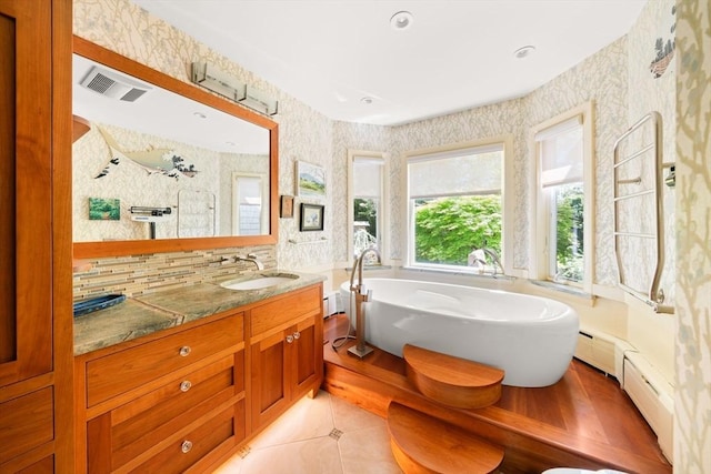 21 Fremont St, Dartmouth, MA 02748 - bathroom with wallpapered walls, vanity, a freestanding bath, and tile patterned flooring