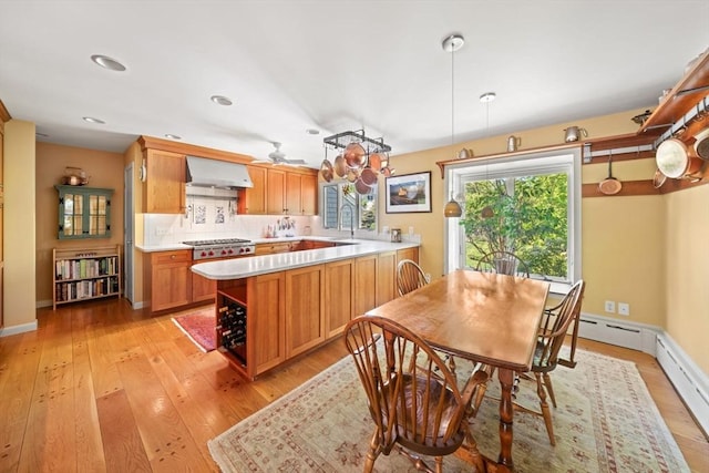 21 Fremont St, Dartmouth, MA 02748 - dining space with light wood-style floors, baseboards, a baseboard heating unit, and recessed lighting